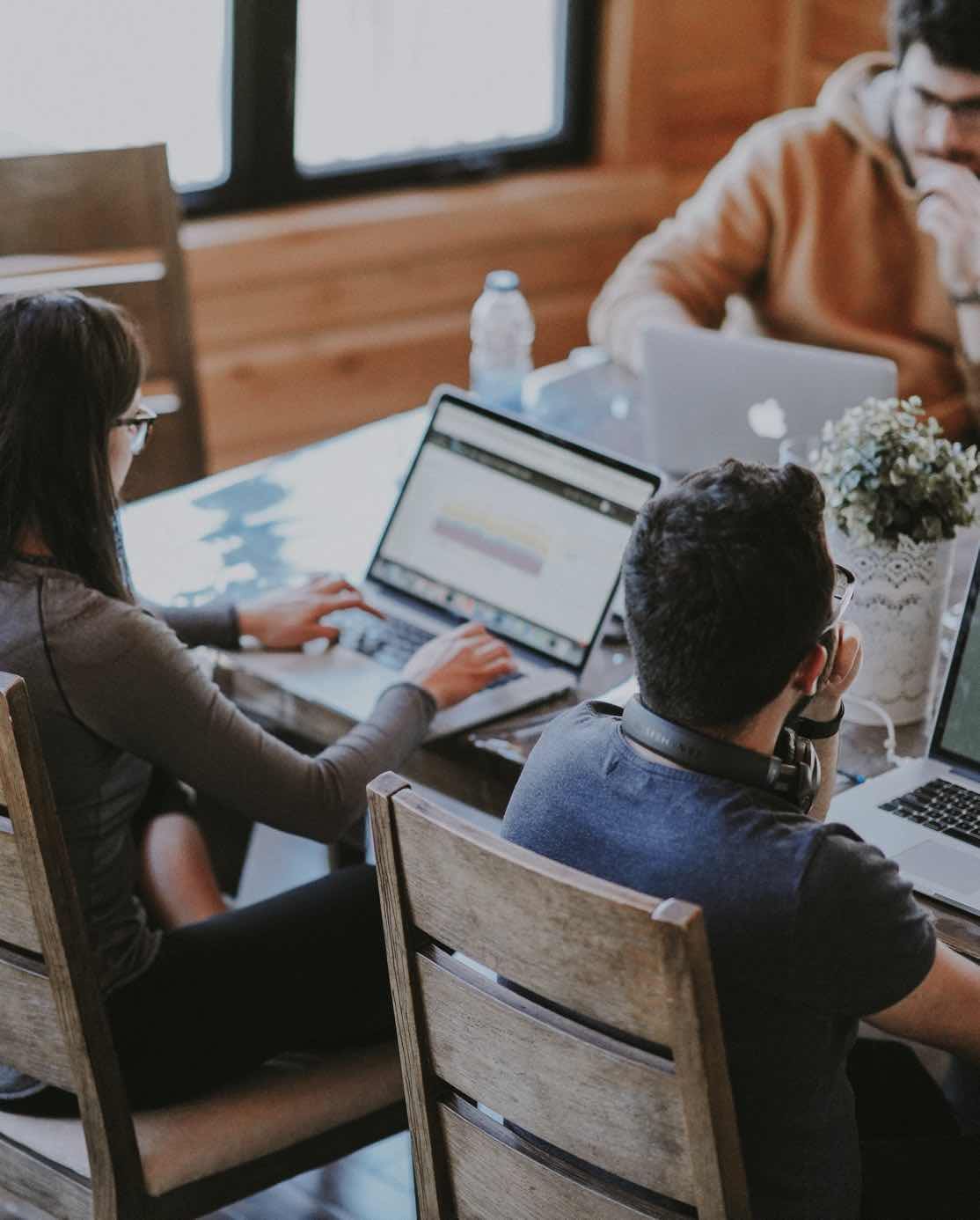 RoZetta team members working side by side at a shared table